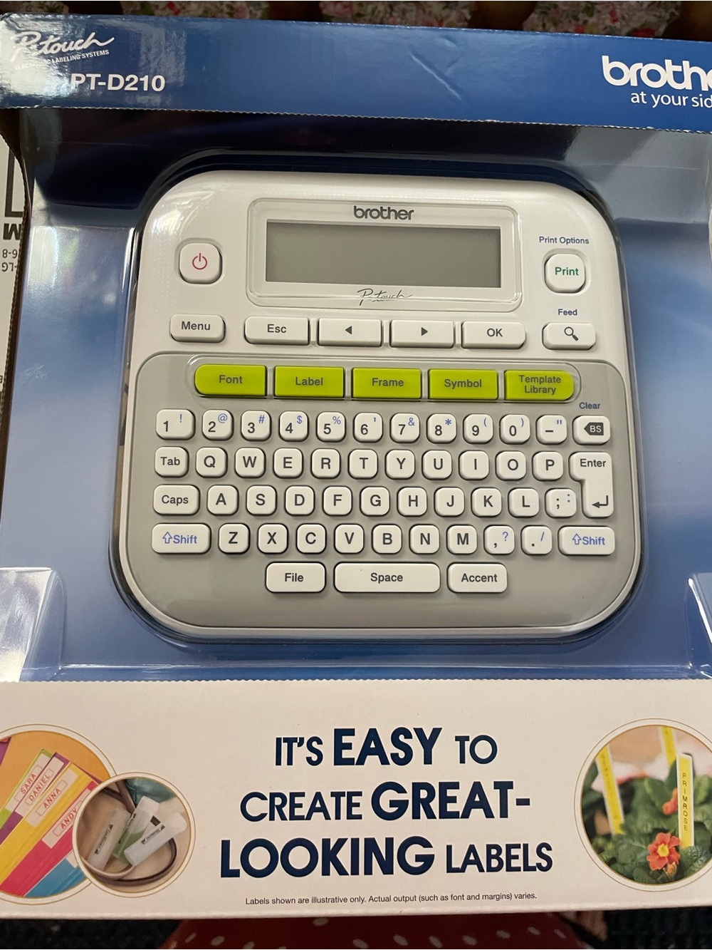 Brother PT-D210 Label Maker in White with Green Buttons and Blue Box